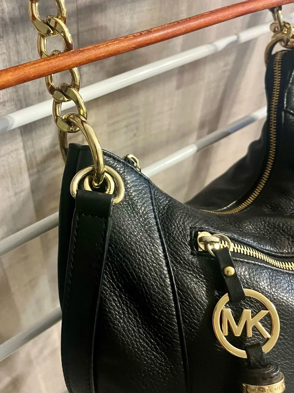 Michael Kors Black Pebbled Leather Hobo with Gold-Tone Tassel Charm